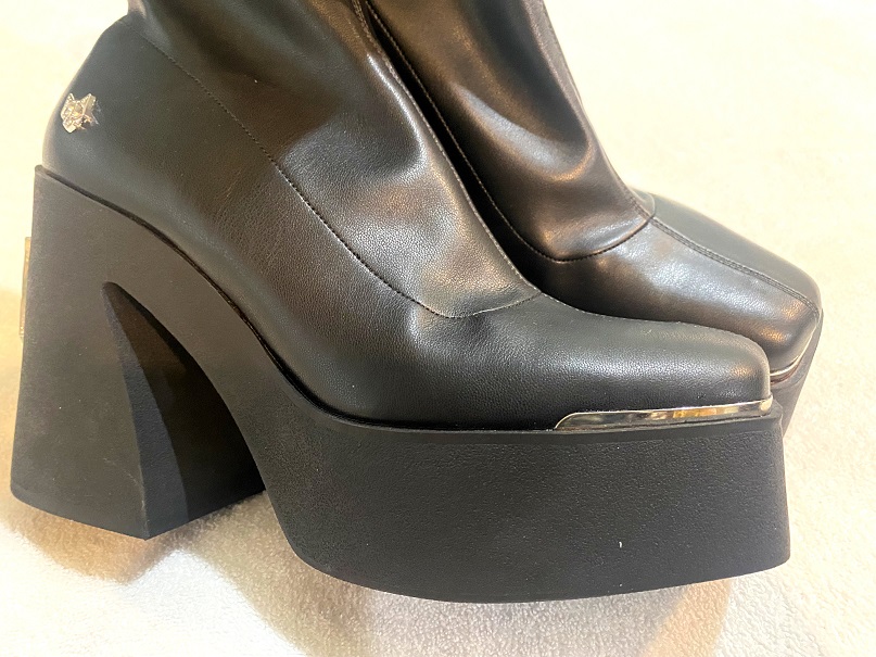 Step Up Your Style Game with Women's Chunky Sole Black Leather Boots by Naked Wolfe - Size 8
